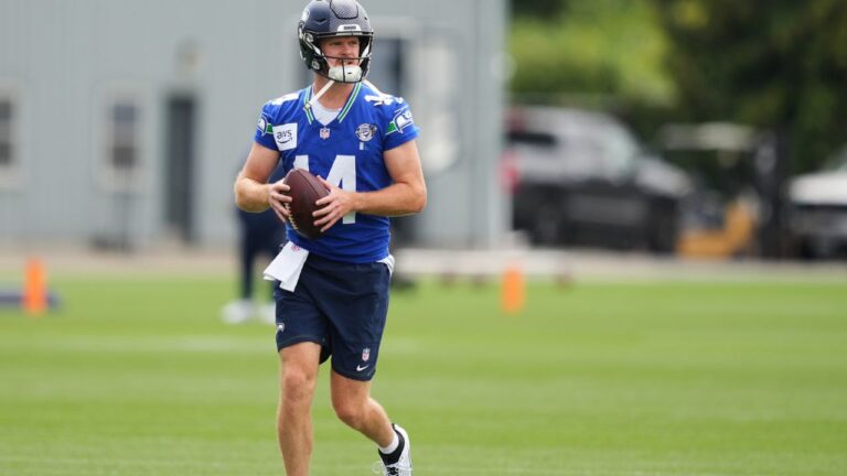 Seattle Seahawks quarterback Sam Darnold carries a ball during the team's training camp, Sunday, July 26, 2026, in Renton, Wash. (Lindsey Wasson/AP)