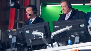 CBS broadcasters Tony Romo and Jim Nantz call the game between the Buffalo Bills and the Denver Broncos in Orchard Park, N.Y., Sunday, Jan. 12, 2025. (Adrian Kraus/AP)