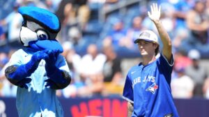 Gavin McKenna, first-overall pick for the Toronto Maple Leafs, arrives to throw the ceremonial first pitch before an AL game between the Toronto Blue Jays and the Texas Rangers, in Toronto, Saturday, June 27, 2026. (Nathan Denette/CP)