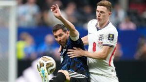 Argentina's Lionel Messi controls the ball next to England's Elliot Anderson, right, during the World Cup semifinal match between England and Argentina in Atlanta, Wednesday, July 15, 2026. (Rebecca Blackwell/AP)