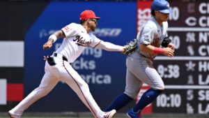 Washington Nationals second baseman Jorbit Vivas tags out Toronto Blue Jays' Kazuma Okamoto attempting to steal during the first inning, Wednesday, July 29, 2026, in Washington. (John McDonnell/AP)