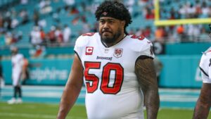Tampa Bay Buccaneers defensive tackle Vita Vea (50) walks the sideline during an NFL football game against the Miami Dolphins Sunday, Dec. 28, 2025, in Miami Gardens, Fla. The Dolphins defeated the Buccaneers 20-17. (AP Photo/Gary McCullough)