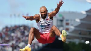 Canada's Damian Warner competes in the men's decathlon long jump at the Commonwealth Games in Glasgow, Scotland, Thursday, July 30, 2026. (AP Photo/Alastair Grant)