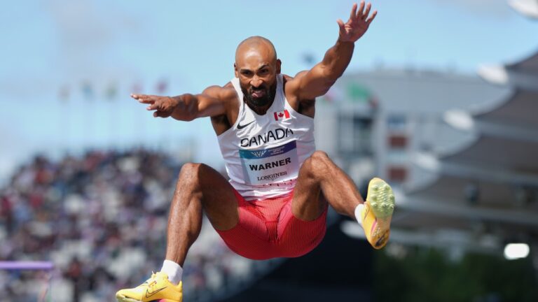 Canada's Damian Warner competes in the men's decathlon long jump at the Commonwealth Games in Glasgow, Scotland, Thursday, July 30, 2026. (AP Photo/Alastair Grant)