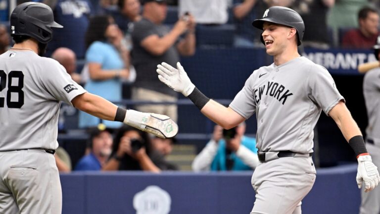 New York Yankees' Austin Wells (28) and Ben Rice celebrate Rice's there-run home run during the sixth inning of a baseball game against the Tampa Bay Rays Thursday, July 9, 2026, in St. Petersburg, Fla. (AP Photo/Jason Behnken)