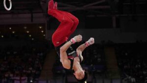 Canada's Ethan Ikeda competes on the rings during the men's team final and individual qualification of Artistic Gymnastics at the Commonwealth Games in Glasgow, Scotland, Friday, July 24, 2026. (Manish Swarup/AP)