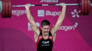 Alex Bellemarre of Canada competes in the men's 94 kilogram weightlifting during the Commonwealth Games in Glasgow, Scotland. (Manish Swarup/AP)