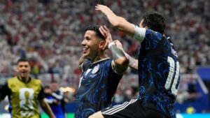 Argentina's Enzo Fernandez celebrates with Lionel Messi, right, after scoring his side's first goal during the World Cup semifinal soccer match between England and Argentina in Atlanta, Wednesday, July 15, 2026. (Rebecca Blackwell/AP)