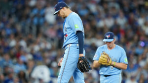 Toronto Blue Jays pitcher Jeff Hoffman (23) looks down after being pulled from the game while playing against The Tampa Bay Rays during sixth inning MLB baseball action in Toronto on Wednesday, July 22, 2026. (Nathan Denette/CP)