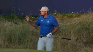 Bryson DeChambeau of the United States reacts after playing a shot on the 17th green during the second day of the British Open Golf championships at Royal Birkdale golf club, in Southport, England, Friday, July 17, 2026. (Jon Super/AP)