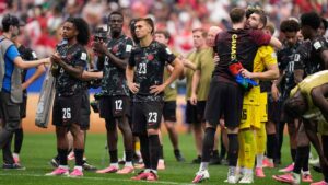 Canada's players react after the World Cup round of 16 soccer match between Canada and Morocco in Houston. (Ashley Landis/AP)