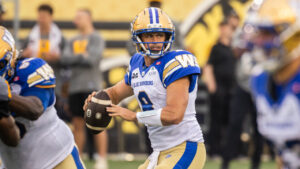 Winnipeg Blue Bombers quarterback Zach Collaros (8) looks for a pass during first half CFL football action against the Hamilton Tiger-Cats, in Hamilton on Sunday, July 5, 2026. (Nick Iwanyshyn/CP)