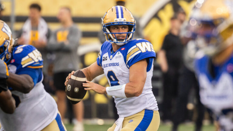 Winnipeg Blue Bombers quarterback Zach Collaros (8) looks for a pass during first half CFL football action against the Hamilton Tiger-Cats, in Hamilton on Sunday, July 5, 2026. (Nick Iwanyshyn/CP)