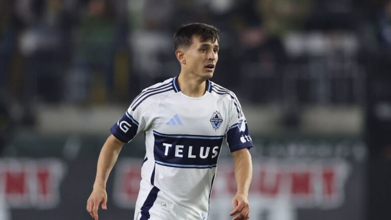 Vancouver Whitecaps midfielder Andrés Cubas (20) plays during an MLS soccer match against the Portland Timbers, Saturday, March 7, 2026, in Portland, Ore. (Amanda Loman/AP)