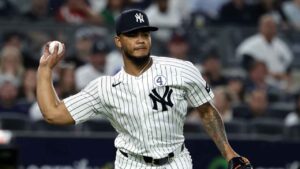 New York Yankees pitcher Camilo Doval (75) throws during the eighth inning of a baseball game. (Adam Hunger/AP)