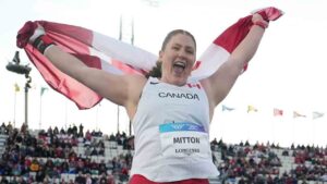 Sarah Mitton, of Canada, celebrates after winning the gold medal in the women's shot put final at the Commonwealth Games in Glasgow, Scotland, Wednesday, July 29, 2026. (Alastair Grant/AP)
