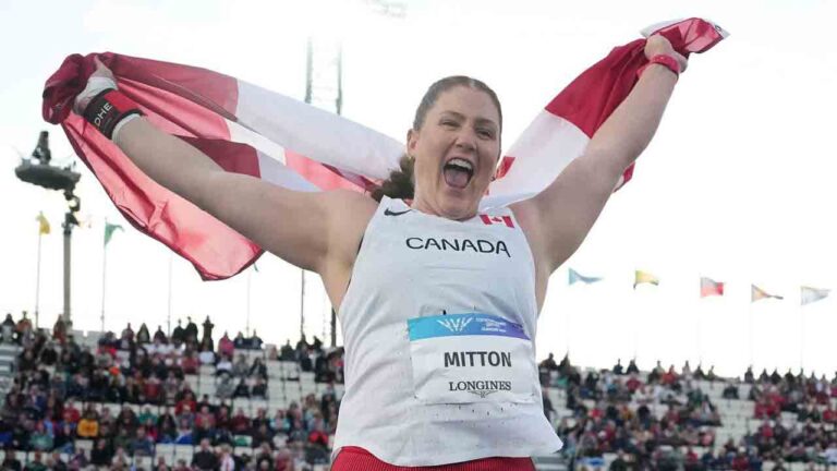 Sarah Mitton, of Canada, celebrates after winning the gold medal in the women's shot put final at the Commonwealth Games in Glasgow, Scotland, Wednesday, July 29, 2026. (Alastair Grant/AP)