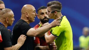 Egypt head coach Hossam Hassan argues with referee Francois Letexier, of France, during the World Cup round of 16 soccer match between Argentina and Egypt in Atlanta, Tuesday, July 7, 2026. (Erik S. Lesser/AP Photo)
