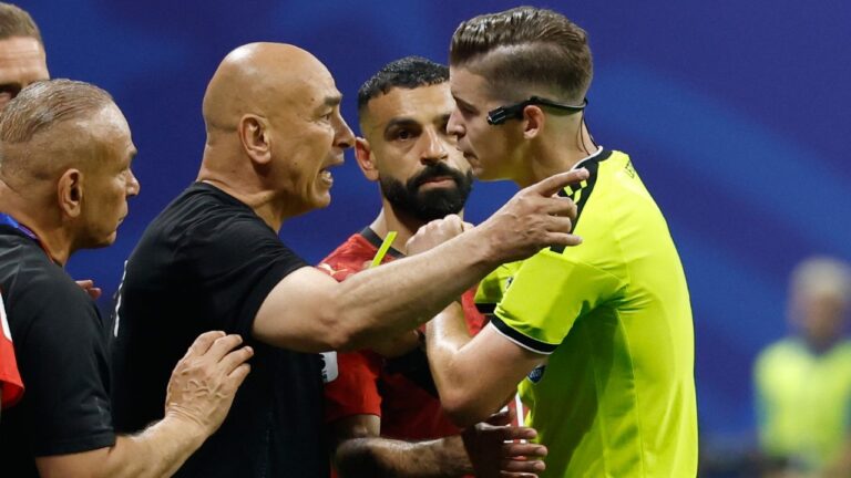 Egypt head coach Hossam Hassan argues with referee Francois Letexier, of France, during the World Cup round of 16 soccer match between Argentina and Egypt in Atlanta, Tuesday, July 7, 2026. (Erik S. Lesser/AP Photo)