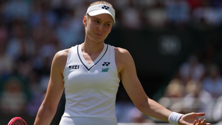 Elena Rybakina of Kazakhstan reacts after losing a point against Elise Mertens of Belgium in their third round women's singles match at the Wimbledon Tennis Championships in London, Saturday, July 4, 2026. (Kirsty Wigglesworth/AP)
