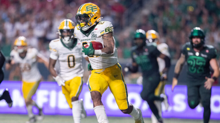 Edmonton Elks running back Javon Leake (22) runs the ball during second half CFL football action against the Saskatchewan Roughriders in Regina on Thursday, July 23, 2026. (Kayle Neis/CP)