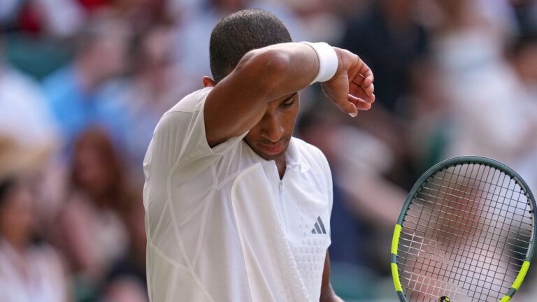 Felix Auger-Aliassime of Canada reacts during the men's quarter-final singles match Novak Djokovic of Serbia against at the Wimbledon Tennis Championships in London, Tuesday, July 7, 2026.(Kirsty Wigglesworth/AP Photo)