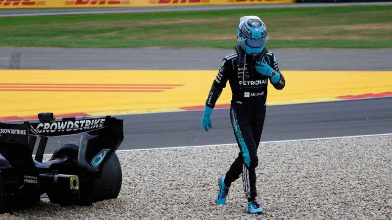 Mercedes driver George Russell of Britain gets out of his car after going off the track during the Formula One Grand Prix at the Spa-Francorchamps racetrack in Spa, Belgium. (Geert Vanden Wijngaert/AP)