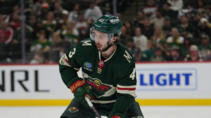 Minnesota Wild defenceman Quinn Hughes (43) skates with the puck during the second period of Game 3 of an NHL Stanley Cup hockey second-round playoff series against the Colorado Avalanche Saturday, May 9, 2026, in St. Paul, Minn. (Abbie Parr/AP)