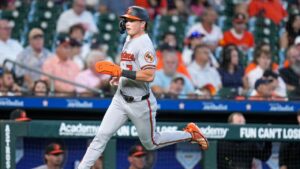 Baltimore Orioles' Jackson Holliday runs home to score on an RBI single hit by Gunnar Henderson during the third inning of a baseball game against the Houston Astros, Sunday, July 19, 2026, in Houston. (Eric Christian Smith/AP)