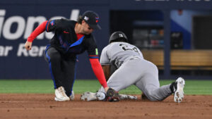Chicago White Sox' Braden Montgomery (24) slides safely into second with a stolen base ahead of a tag by Toronto Blue Jays infielder Ernie Clement (22) during second inning MLB baseball action in Toronto on Friday, July 17, 2026. (Jon Blacker/CP)