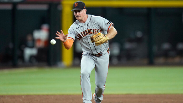 San Francisco Giants third baseman Matt Chapman makes a one-handed grab on a grounder hit by Arizona Diamondbacks' Gabriel Moreno (14) before throwing to first base for the out during the sixth inning of a baseball game, Tuesday, June 30, 2026, in Phoenix. (Ross D. Franklin/AP)