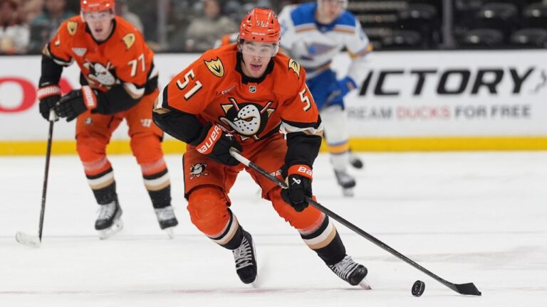 Anaheim Ducks defenceman Olen Zellweger (51) brings the up puck up the ice during the third period of an NHL hockey game against the St. Louis Blues Friday, April 3, 2026, in Anaheim, Calif. (Gregory Bull/AP)
