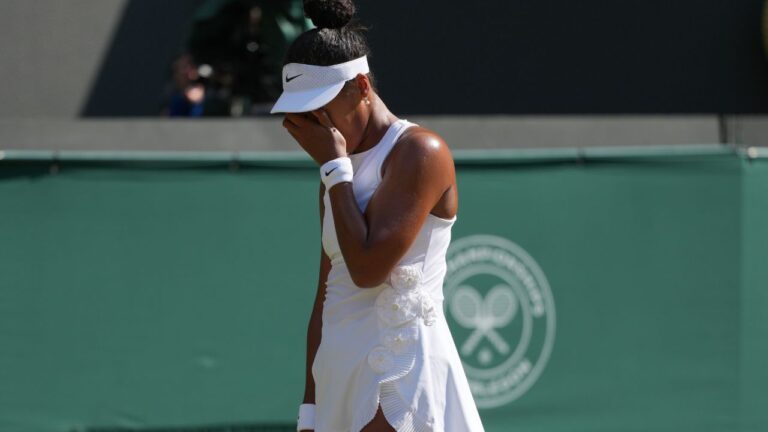 Naomi Osaka of Japan reacts after losing a point against Karolina Muchova of Czechia in their quarterfinal women's singles match at the Wimbledon Tennis Championships in London, Tuesday, July 7, 2026. (Kin Cheung/AP Photo)