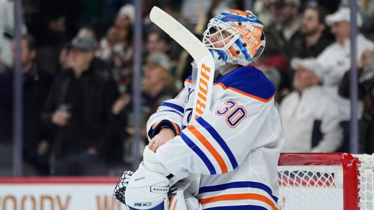 Edmonton Oilers goaltender Calvin Pickard looks at the replay screen after a goal scored by Minnesota Wild left wing Matt Boldy during the first period of an NHL hockey game, Saturday, Dec. 20, 2025, in St. Paul, Minn. (Abbie Parr/AP)