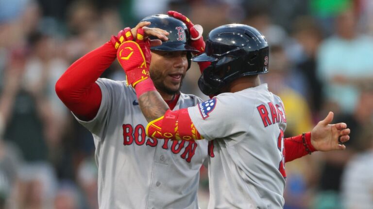 Boston Red Sox's Ceddanne Rafaela, right, celebrates with teammate Willson Contreras, left, after hitting a grand slam during the sixth inning of a baseball game against the Athletics, Monday, July 27, 2026, in West Sacramento, Calif. (Scott Marshall/AP Photo)