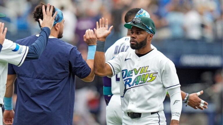 Tampa Bay Rays centre fielder Cedric Mullins, right, celebrates with teammates after defeating the Cleveland Guardians during a baseball game Sunday, July 26, 2026, in St. Petersburg, Fla. (Chris O'Meara/AP)