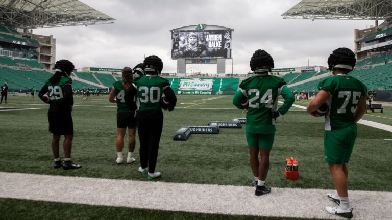 A tribute to Saskatchewan Roughriders player Jayden Dalke is shown on a video display during the Roughriders practice at Mosaic Stadium in Regina on Monday, July 20, 2026. (Kayle Neis/THE CANADIAN PRESS)