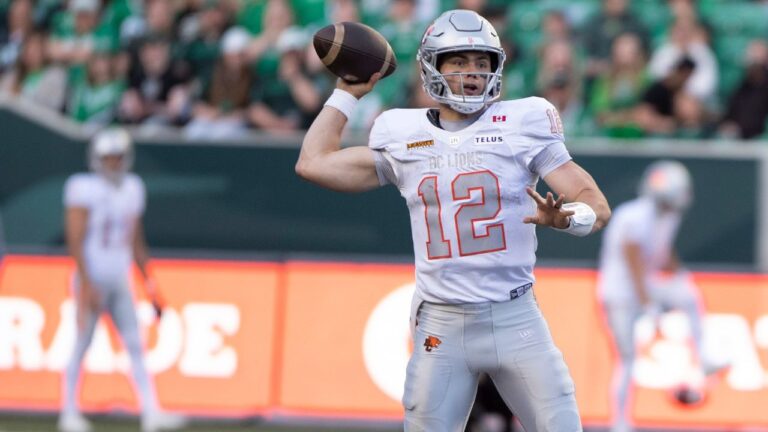 BC Lions quarterback Nathan Rourke (12) lines up a pass during second half CFL football action in Regina on Saturday, June 13, 2026. (Kayle Neis/CP)