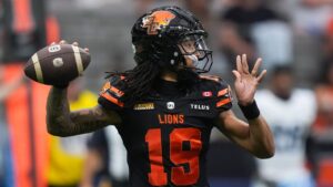 B.C. Lions quarterback Kaidon Salter (19) passes during the second half of a CFL football game against the Toronto Argonauts, in Vancouver, on Saturday, July 25, 2025. (Darryl Dyck/THE CANADIAN PRESS)