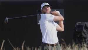 Sam Burns of the United States plays off the 10th tee during the third day of the British Open Golf championships at Royal Birkdale golf club, in Southport, England, Saturday, July 18, 2026. (Peter Morrison/AP)