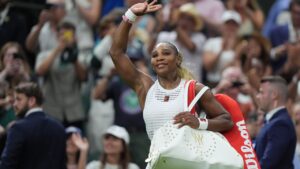Serena Williams of the United States greets the audience as she leaves after losing to Maya Joint of Australia in their first round women's singles match at the Wimbledon Tennis Championships in London, Tuesday, June 30, 2026. (Maja Smiejkowska/AP)
