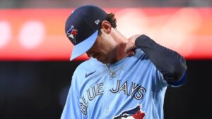 Toronto Blue Jays pitcher Shane Bieber walks back to the dugout after he was pulled from a baseball game in the first inning against the Washington Nationals, Tuesday, July 28, 2026, in Washington. (Nick Wass/AP Photo)