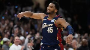 Cleveland Cavaliers' Donovan Mitchell (45) gestures after hitting a three-point basket in the second half of Game 4 of a second-round NBA basketball playoff series against the Detroit Pistons Monday, May 11, 2026, in Cleveland. (Sue Ogrocki/AP)