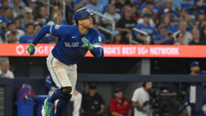 Toronto Blue Jays designated hitter George Springer (4) runs out a single against the Tampa Bay Rays during sixth inning MLB baseball action in Toronto on Monday, July 20, 2026. (Jon Blacker/CP)