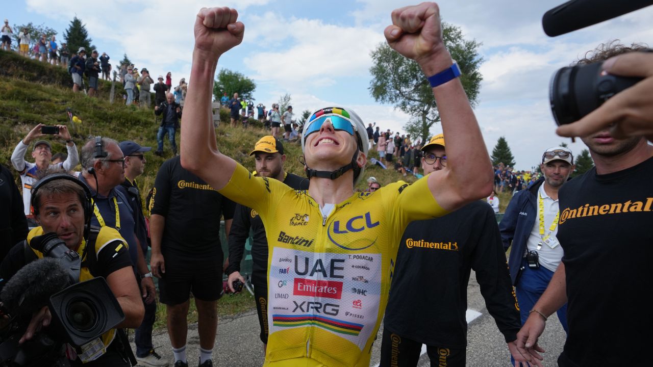 Pogacar launches late attack to win 14th stage, build on Tour de France lead Pogacar launches late attack to win 14th stage, build on Tour de France lead