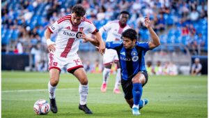 Toronto FC's Kobe Franklin (19) and CF Montreal's Efrain Morales (24) vie for the ball during first half MLS soccer action, in Montreal on Thursday, July 16, 2026. (Christopher Katsarov/THE CANADIAN PRESS)