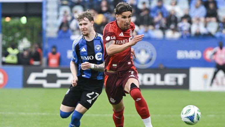 Toronto FC's Theo Corbeanu (7) breaks away from CF Montreal's Dawid Bugaj (27) during second half MLS soccer action in Montreal, Saturday, May 17, 2025. (Graham Hughes/CP)