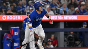 Toronto Blue Jays' Daulton Varsho (5) runs out a double against the Chicago White Sox during sixth inning MLB baseball action in Toronto, Saturday, July 18, 2026. (Jon Blacker/CP)