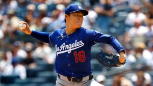 Los Angeles Dodgers' Yoshinobu Yamamoto delivers during the first inning of the first game of a baseball doubleheader against the New York Yankees, Sunday, July 19, 2026, in New York. (Noah K. Murray/AP)