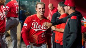 Cincinnati Reds' JJ Bleday, is all smiles after hitting a home run to complete hitting for the cycle during the sixth inning of a baseball game against the Arizona Diamondbacks, Saturday, Aug. 22, 2026, in Phoenix. (Darryl Webb/AP)